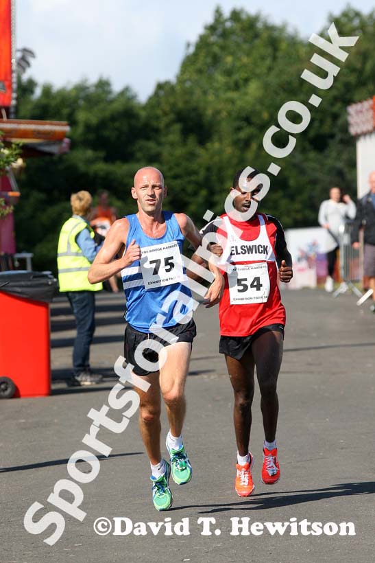 Ian Hudspith (Morpeth) and Tadele Geremew (Elswick)  during the Tyne Bridge Harriers Exhibition Park 5k, Newcastle.